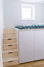 Hoog bed met slimme opbergruimte