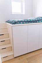 Hoog bed met slimme opbergruimte