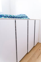 Hoog bed met slimme opbergruimte